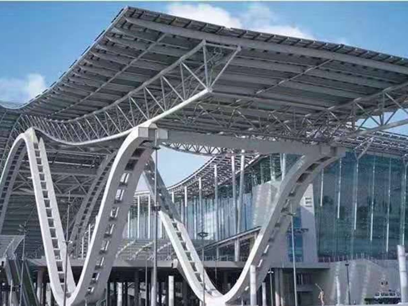 Curved structural steel canopy at a transport facility